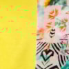 BLUSA EM TECIDO ESTAMPADO FRENTE E COSTAS EM MALHA LISA - AMARELO